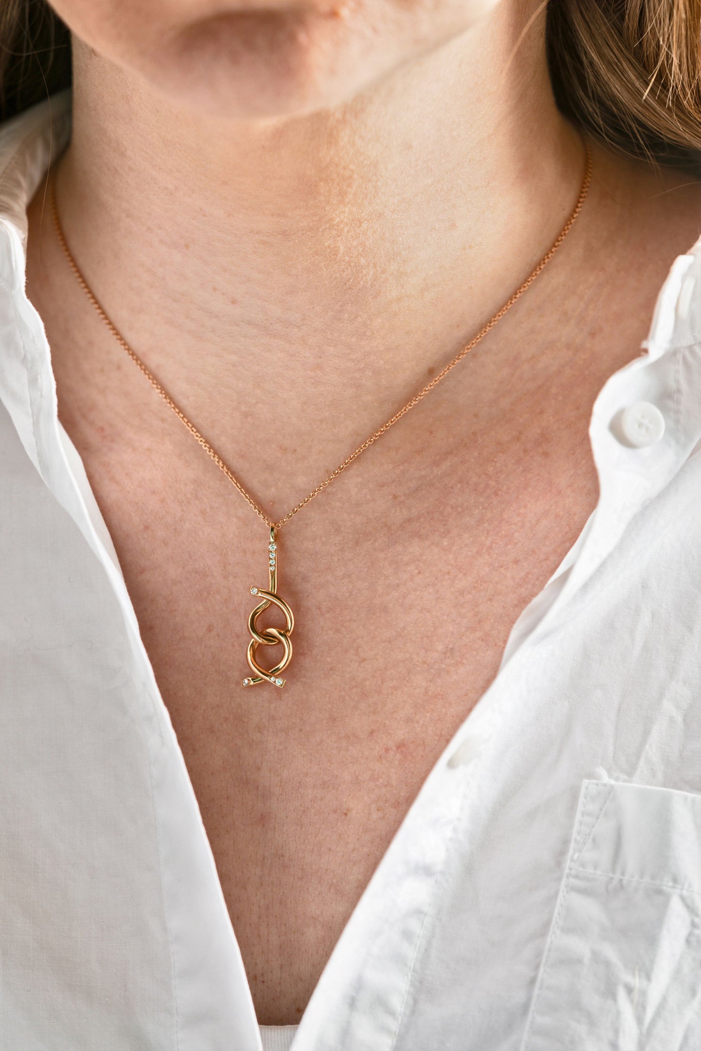 Brain teaser necklace, 18K gold and diamond